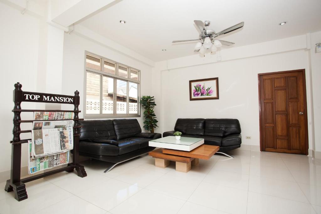 Un lugar para sentarse en Top Hostel (Top Mansion)