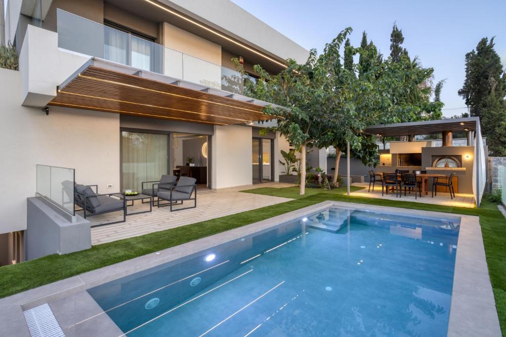 Bazén v ubytování Crystal Sun Luxury Villa by Estia nebo v jeho okolí