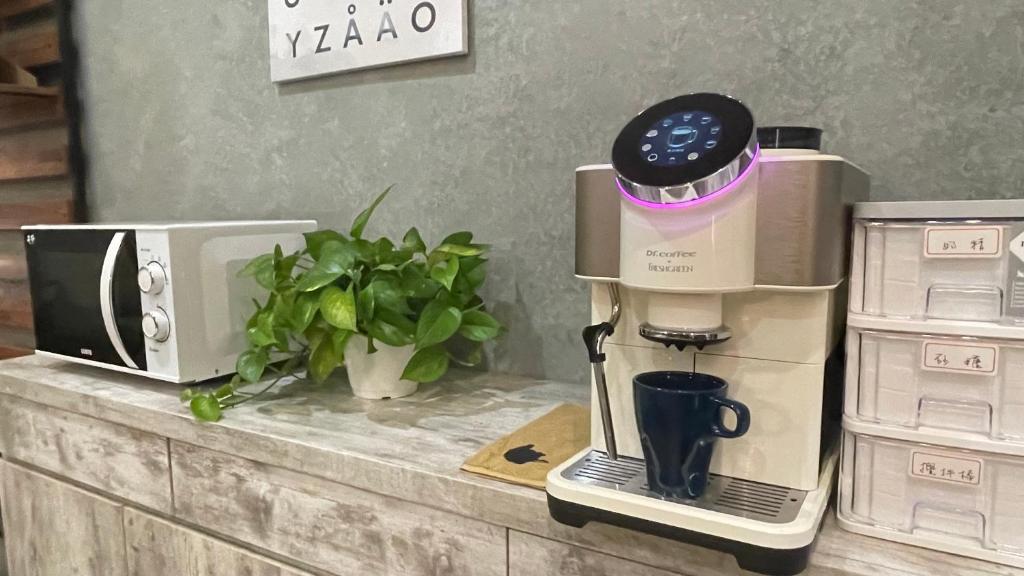 Příslušenství pro přípravu čaje a kávy v ubytování 鄉間小路 Home 備有專屬停車場