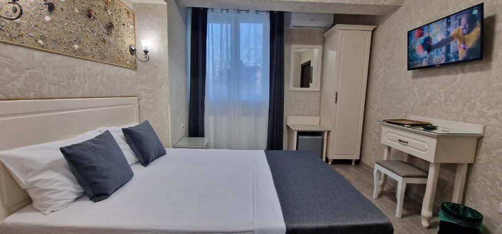 Postel nebo postele na pokoji v ubytování Florian Rooms