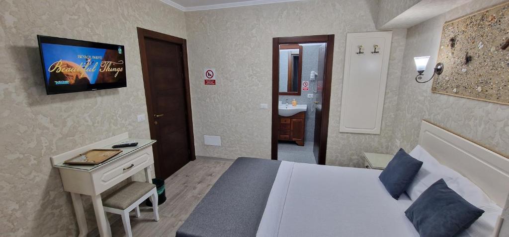 TV a/nebo společenská místnost v ubytování Florian Rooms