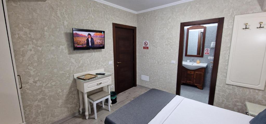 Postel nebo postele na pokoji v ubytování Florian Rooms
