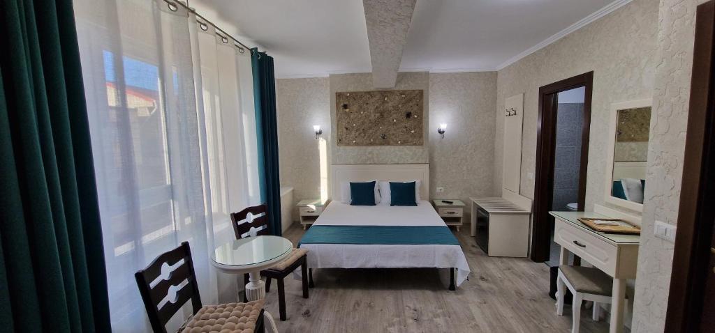 Postel nebo postele na pokoji v ubytování Florian Rooms