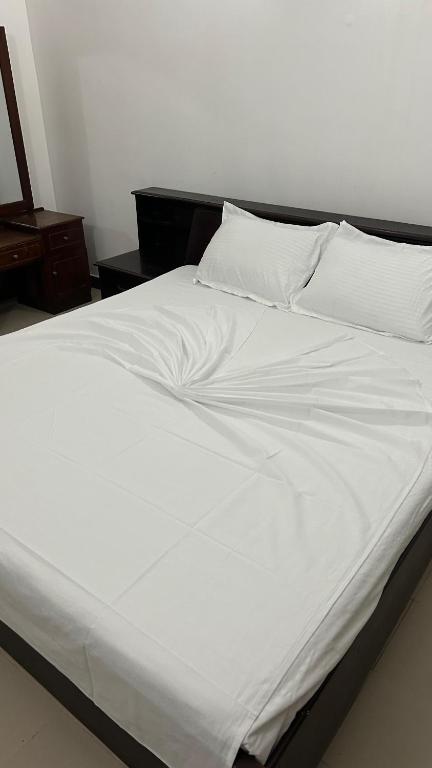 Postel nebo postele na pokoji v ubytování Himo Guest Inn