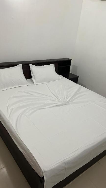 Postel nebo postele na pokoji v ubytování Himo Guest Inn
