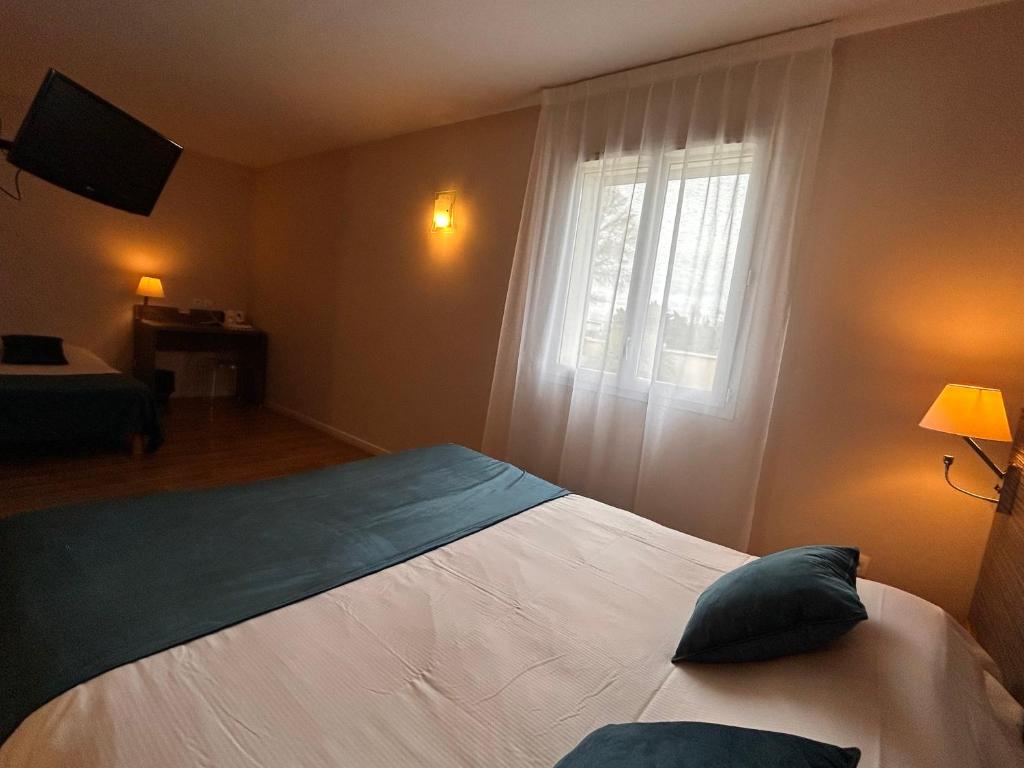 Postel nebo postele na pokoji v ubytování Hotel Caiman