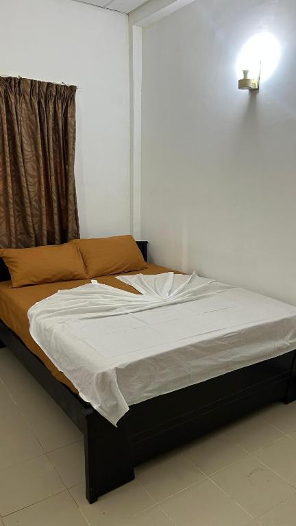 Postel nebo postele na pokoji v ubytování Himo Guest Inn