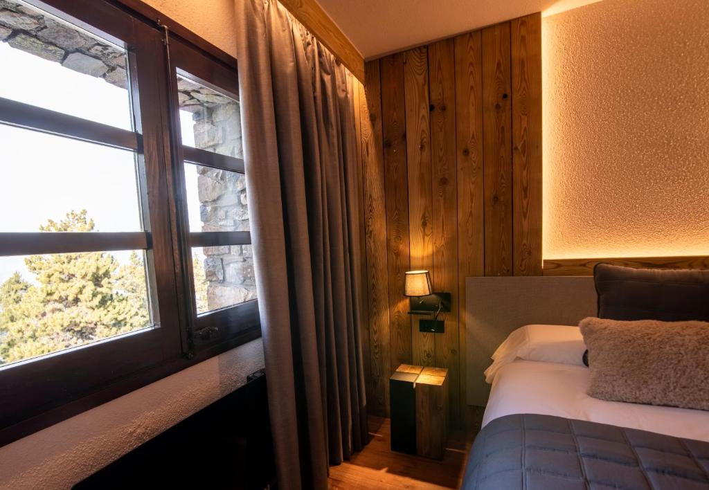 Postel nebo postele na pokoji v ubytování Borda Conangle Mountain Lodge