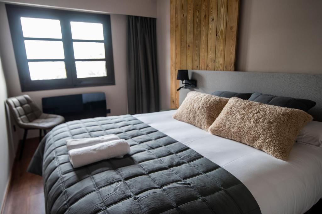 Postel nebo postele na pokoji v ubytování Borda Conangle Mountain Lodge