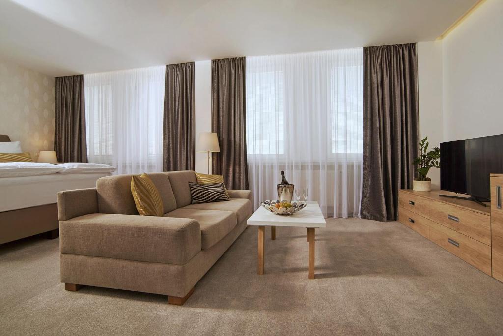 TV a/nebo společenská místnost v ubytování Privilege Apartments