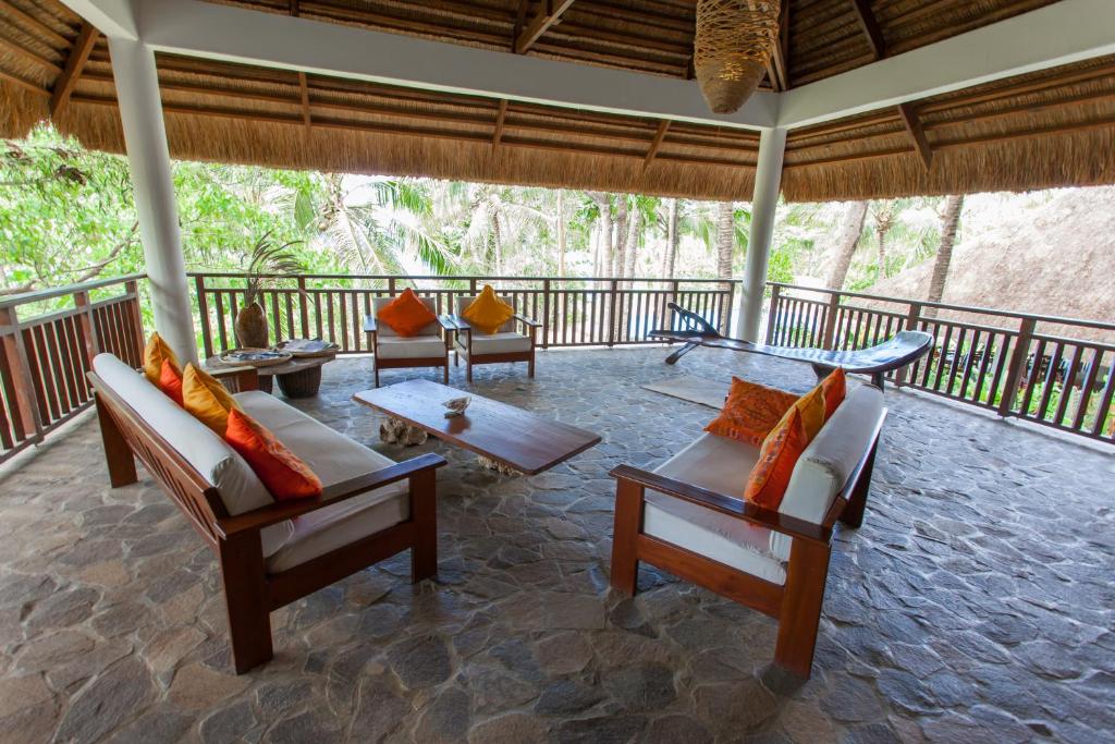 Balkón nebo terasa v ubytování Amun Ini Beach Resort & Spa