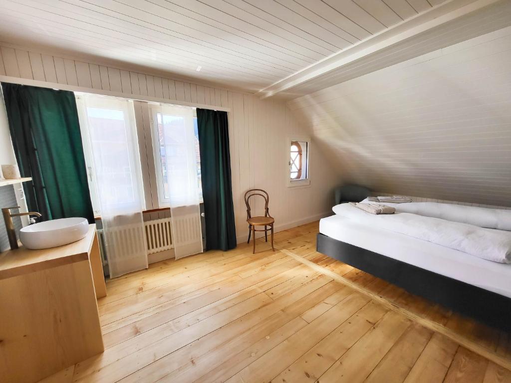 Postel nebo postele na pokoji v ubytování Refugio Heiligkreuz