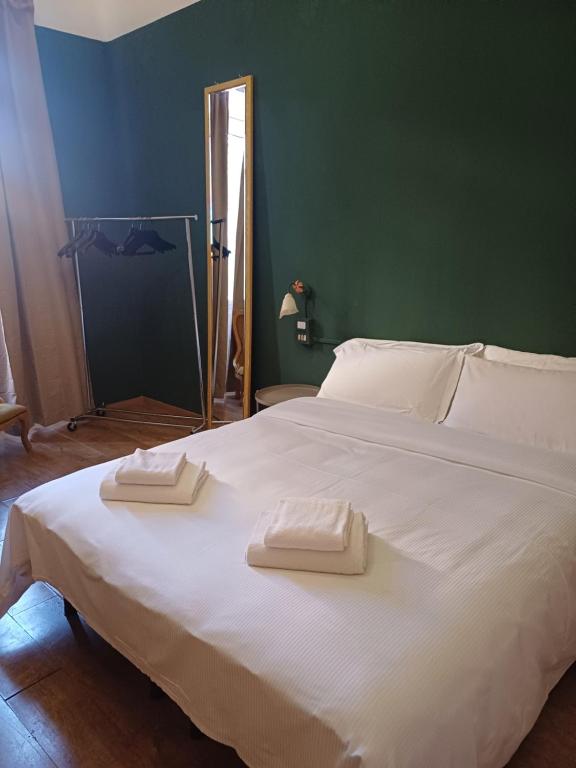 Posteľ alebo postele v izbe v ubytovaní Albergo Malibu