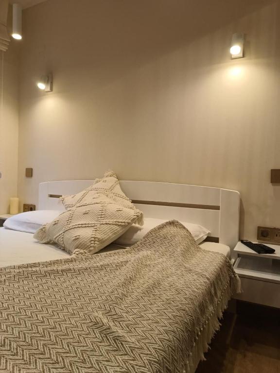 Postel nebo postele na pokoji v ubytování Chechar Inn Zlatar