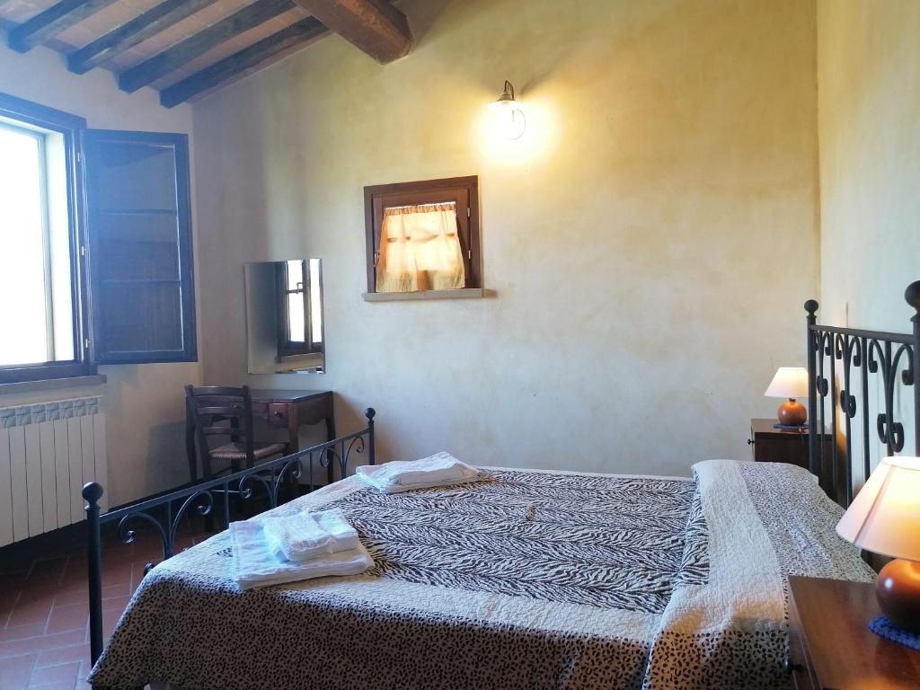 Postel nebo postele na pokoji v ubytování Residence Il Monastero