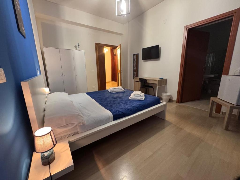 Postel nebo postele na pokoji v ubytování Vespro Guest House