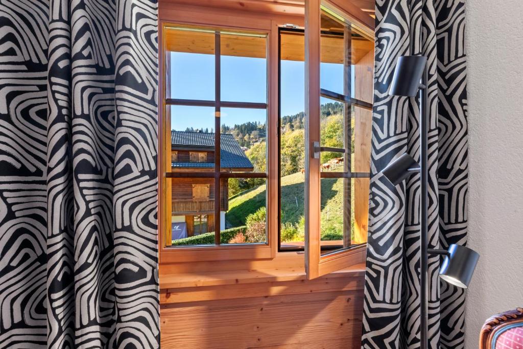 Balkón nebo terasa v ubytování Chalet apartment with balcony and Alpine view