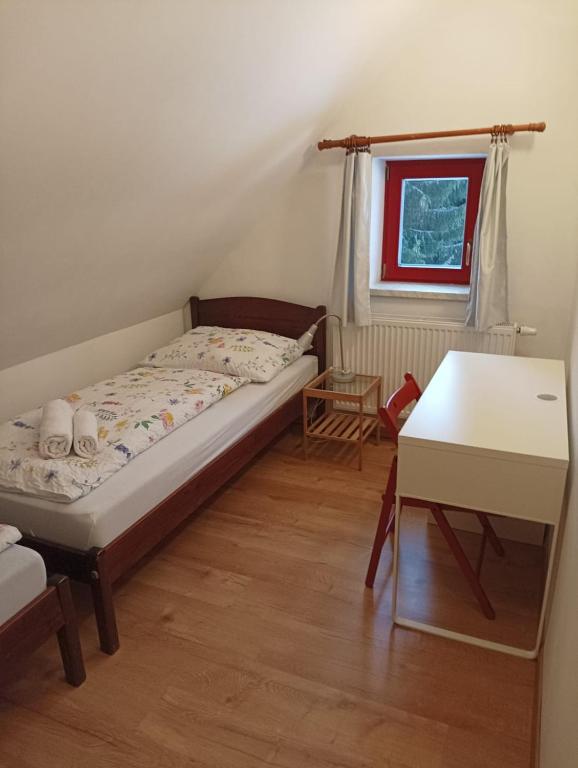 Postel nebo postele na pokoji v ubytování Apartmány Na samotě