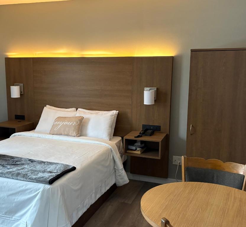 Postel nebo postele na pokoji v ubytování Motel Fraser