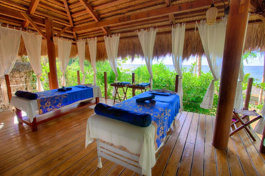 Zahrada ubytování Amun Ini Beach Resort & Spa