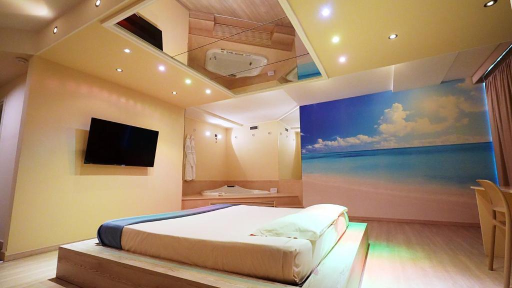 TV a/nebo společenská místnost v ubytování Motel Soignè