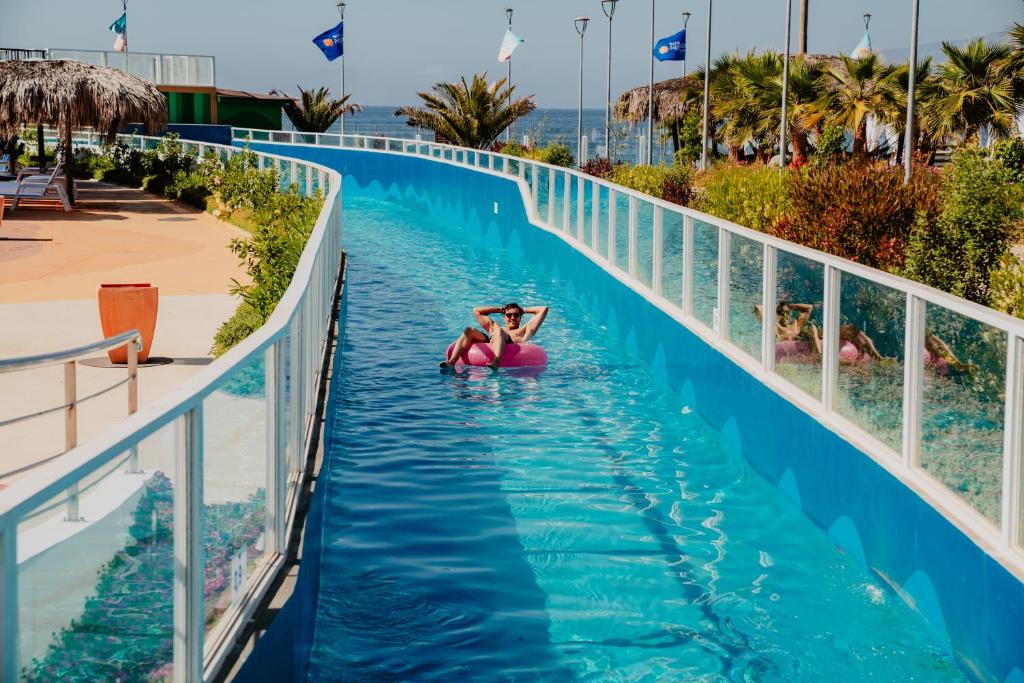 Bazén v ubytování Rosa Agustina Guanaqueros Resort nebo v jeho okolí