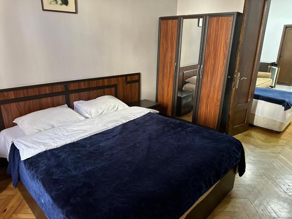 Postel nebo postele na pokoji v ubytování Hotel Cattaleya