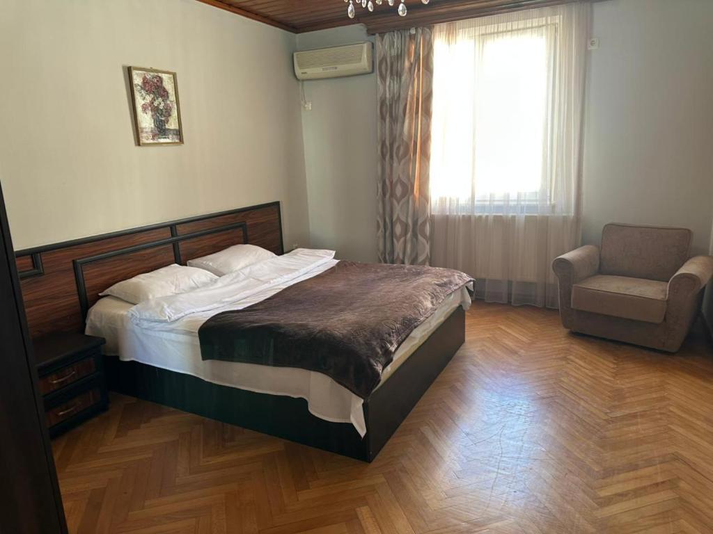 Postel nebo postele na pokoji v ubytování Hotel Cattaleya
