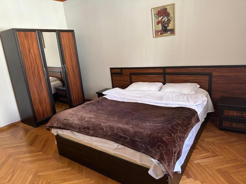 Postel nebo postele na pokoji v ubytování Hotel Cattaleya