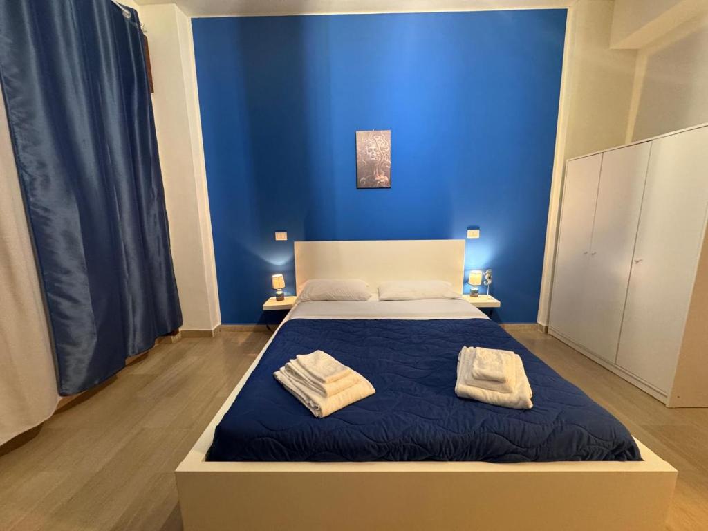 Postel nebo postele na pokoji v ubytování Vespro Guest House