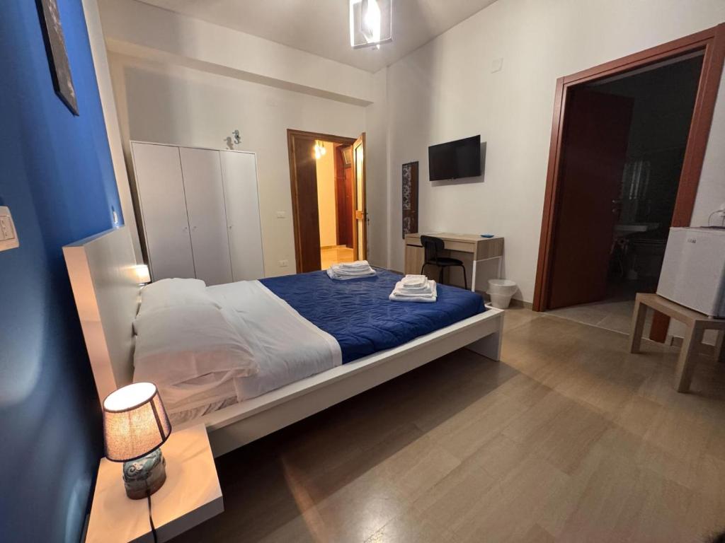 Postel nebo postele na pokoji v ubytování Vespro Guest House