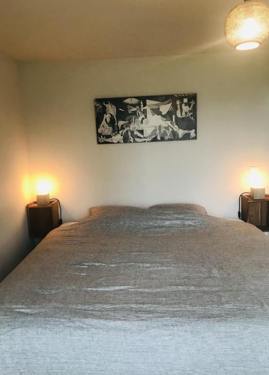 Postel nebo postele na pokoji v ubytování Panacée Guesthouses