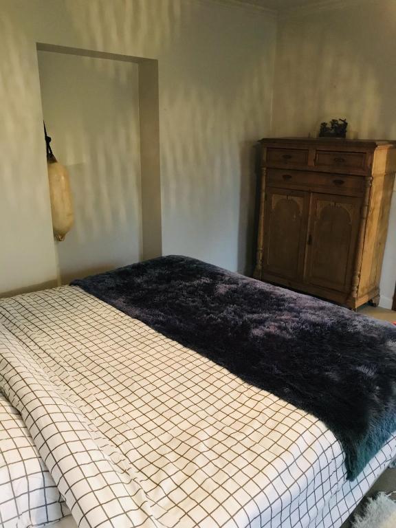 Postel nebo postele na pokoji v ubytování Panacée Guesthouses