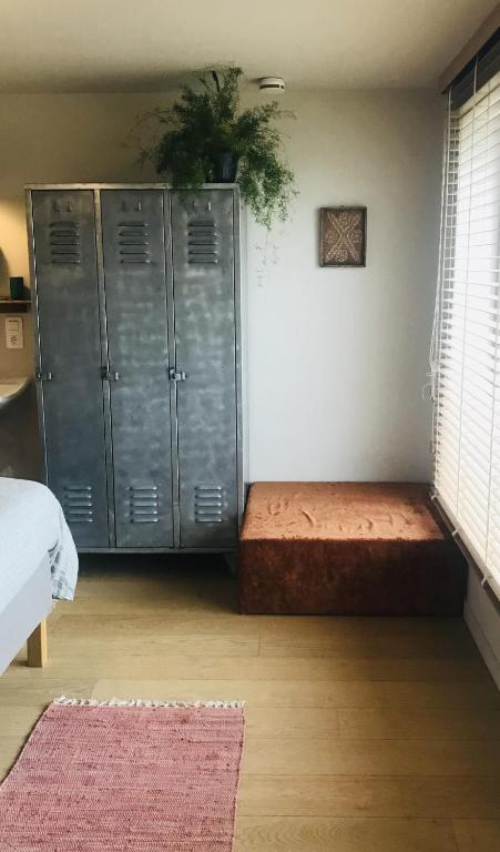 Postel nebo postele na pokoji v ubytování Panacée Guesthouses