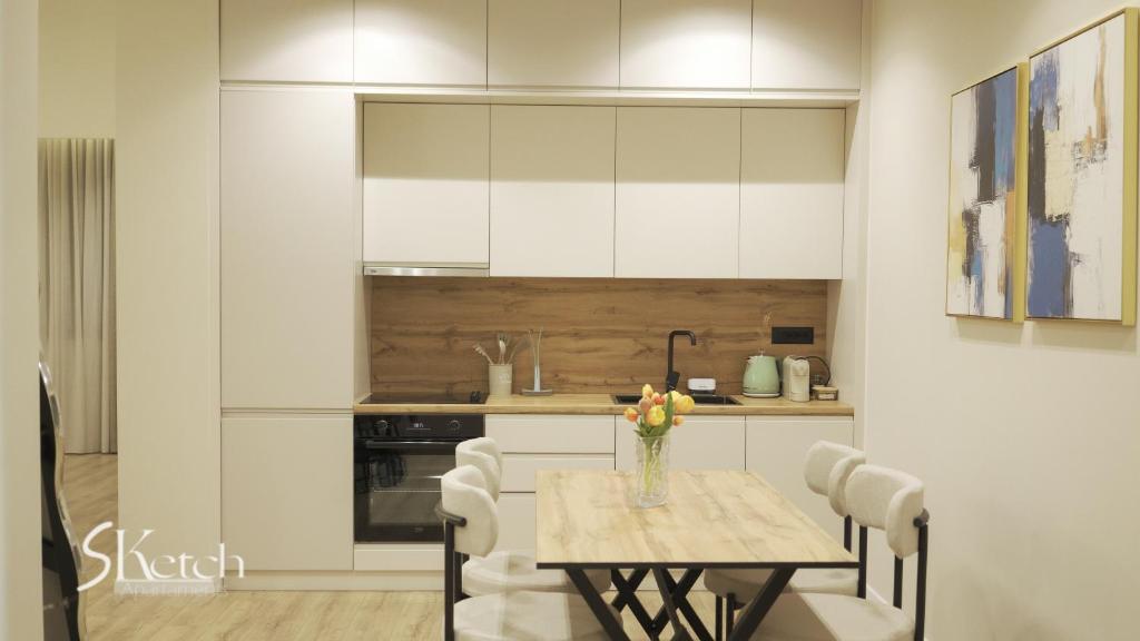 Kuchyň nebo kuchyňský kout v ubytování SKetch Apartments