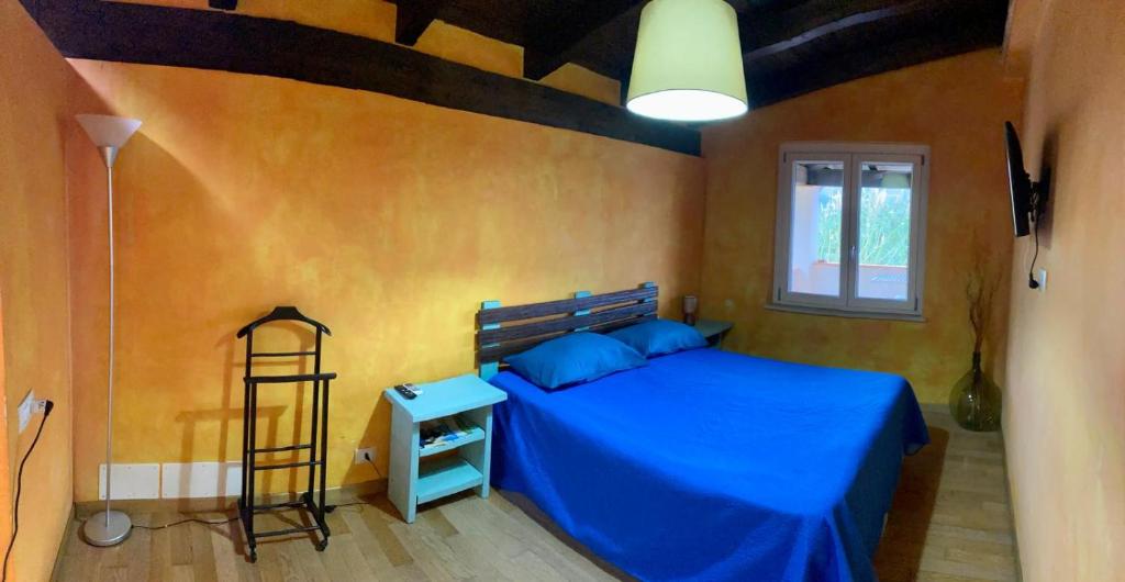 Postel nebo postele na pokoji v ubytování Affittacamere L’ Agrumeto