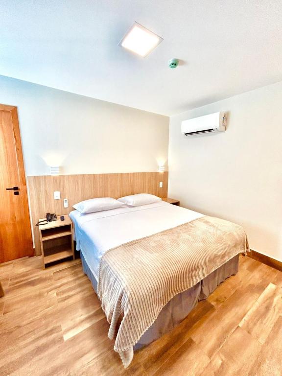 Postel nebo postele na pokoji v ubytování Hit Hotel
