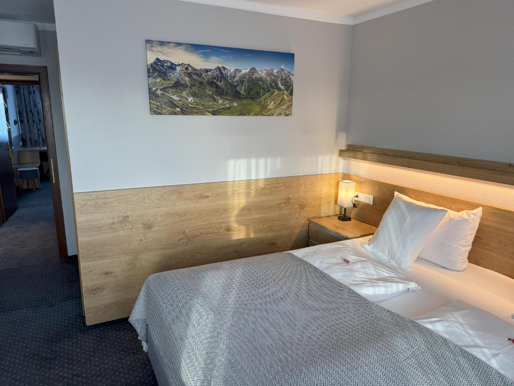 Postel nebo postele na pokoji v ubytování Hotel Zum Ritter