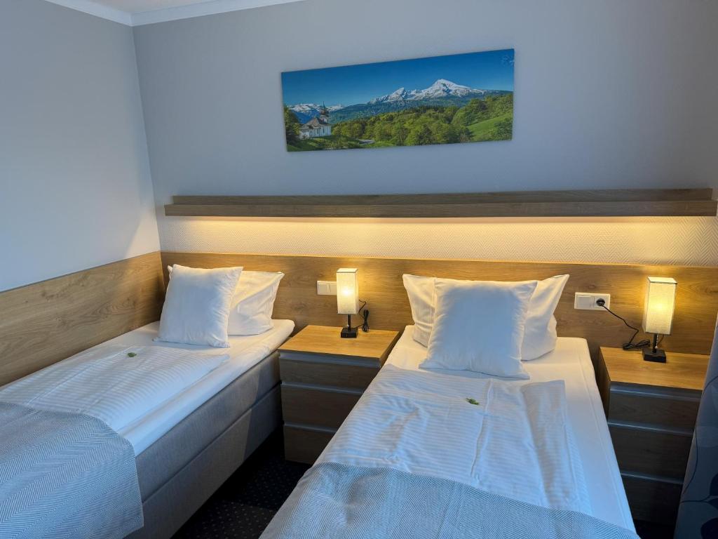 Postel nebo postele na pokoji v ubytování Hotel Zum Ritter