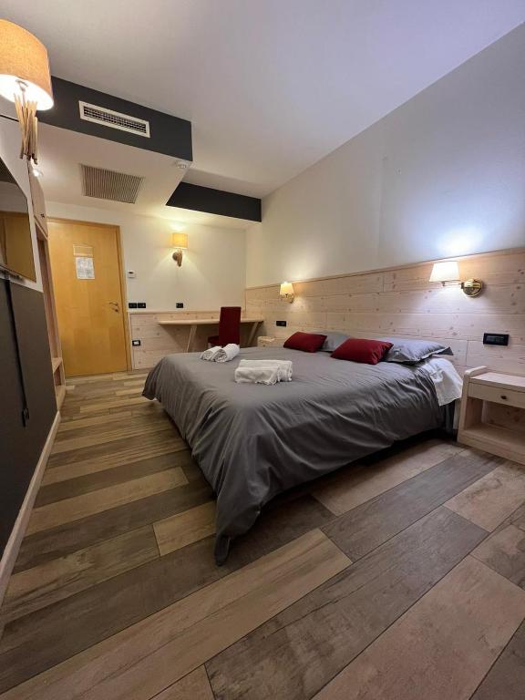 Postel nebo postele na pokoji v ubytování Damodoro Hotel