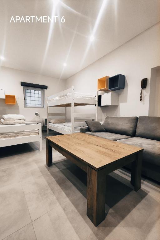 Postel nebo postele na pokoji v ubytování Pekarna apartments