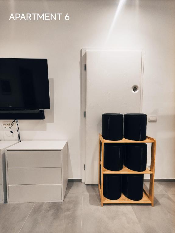 TV a/nebo společenská místnost v ubytování Pekarna apartments