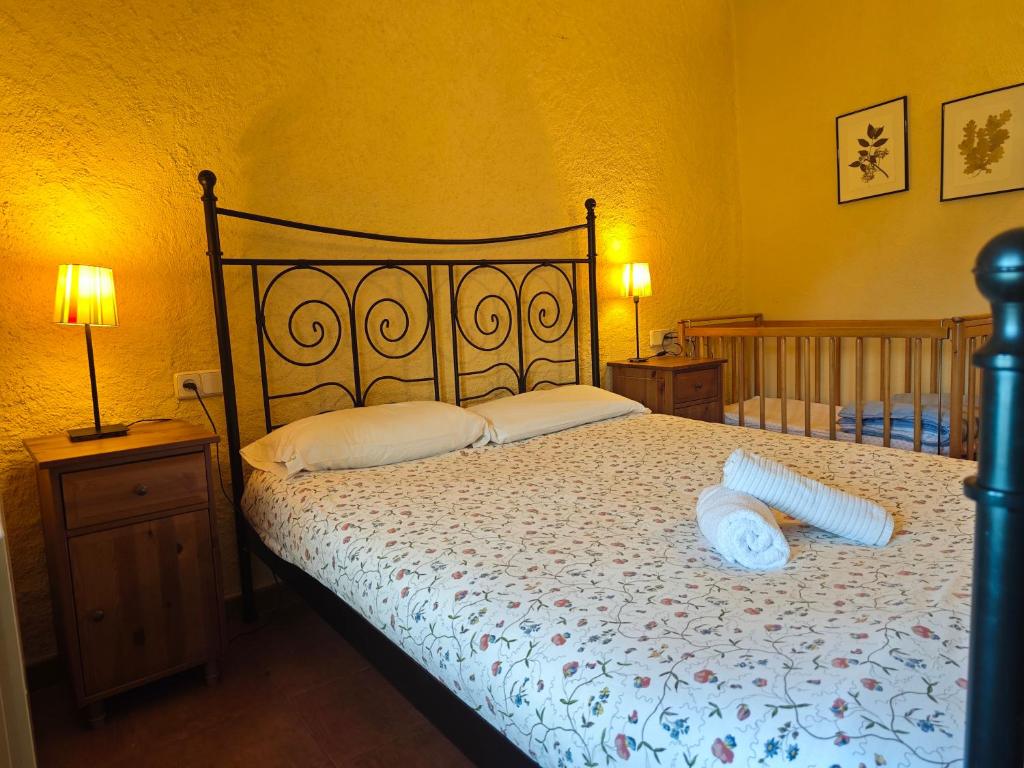 Postel nebo postele na pokoji v ubytování Can Simonet de Rocabruna