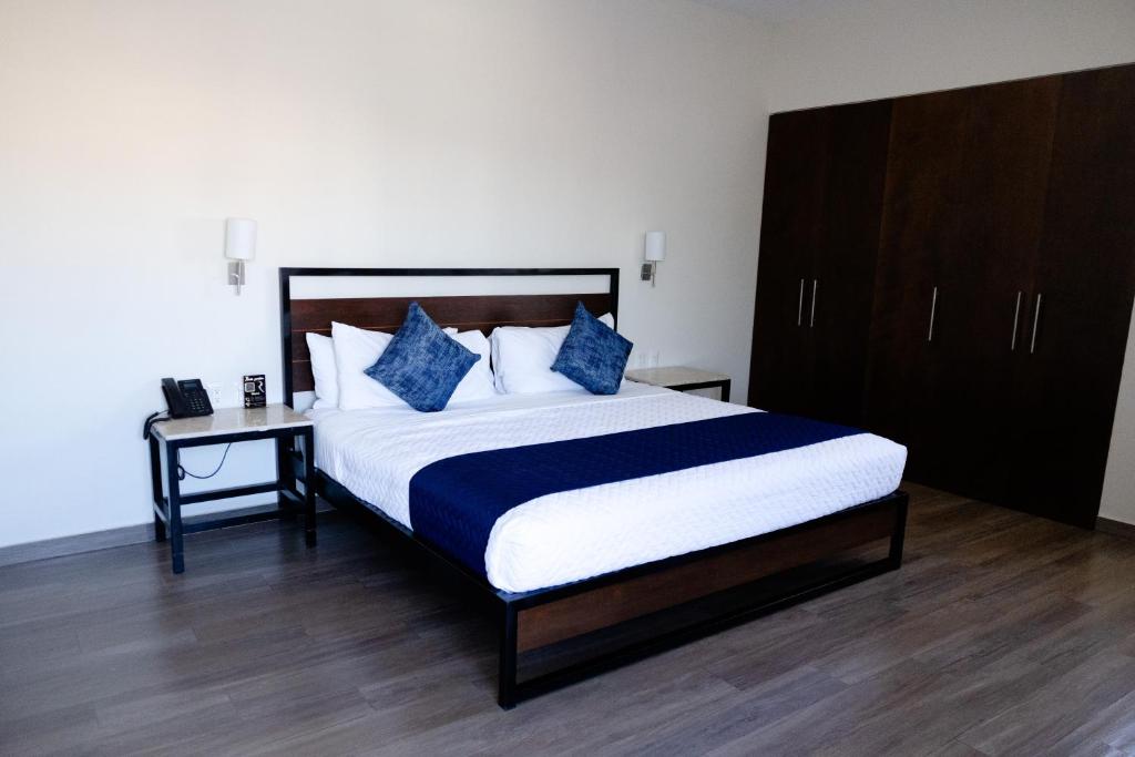 Postel nebo postele na pokoji v ubytování Hotel Refugio
