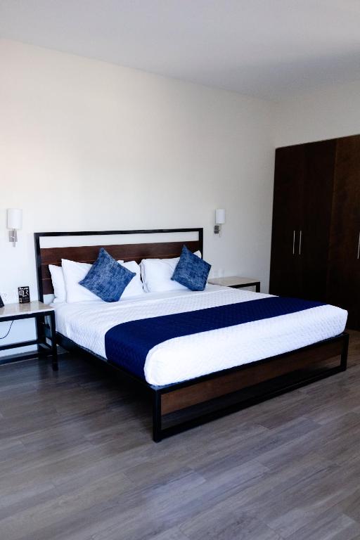 Postel nebo postele na pokoji v ubytování Hotel Refugio