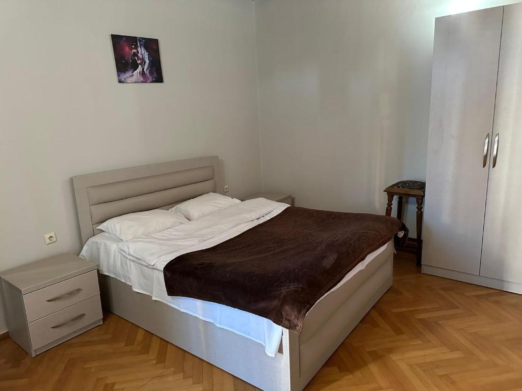 Postel nebo postele na pokoji v ubytování Hotel Cattaleya