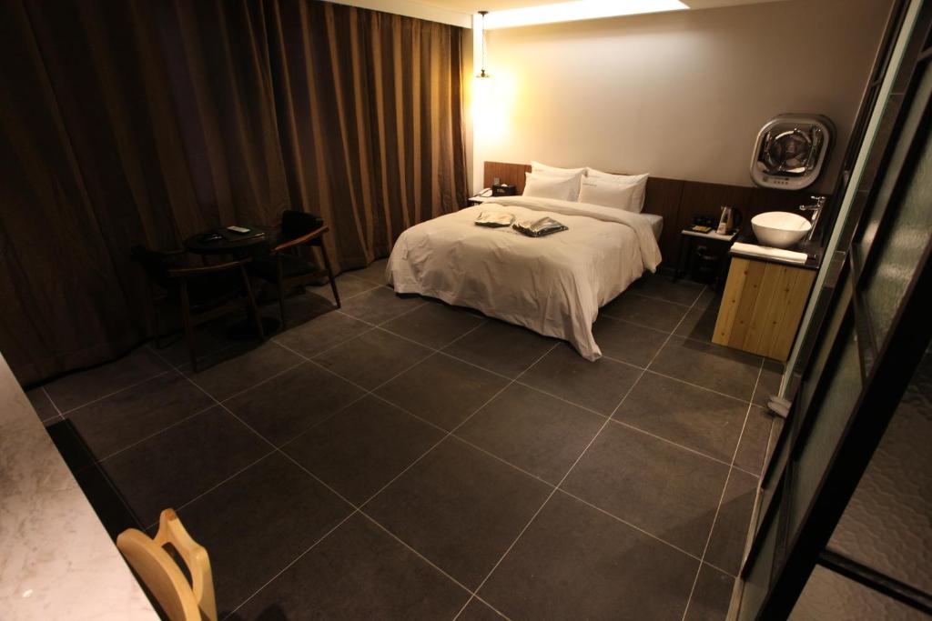 Postel nebo postele na pokoji v ubytování Hotel Cacao