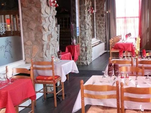 Posezení v ubytování Hôtel Le Hussard