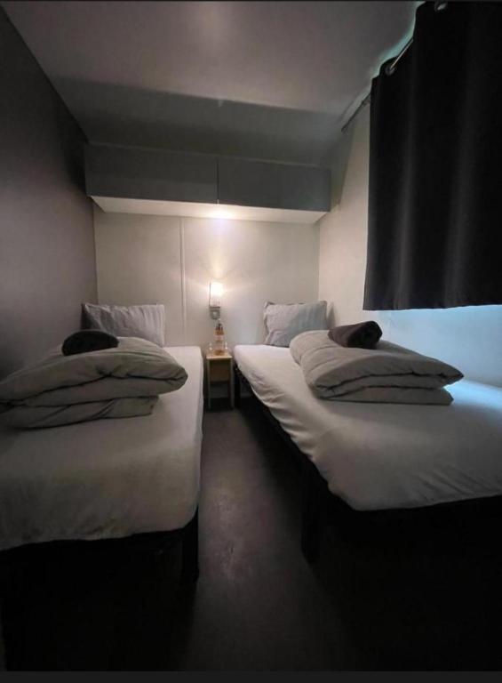 Postel nebo postele na pokoji v ubytování Lydia's Mobilhome am Europa-Park Rulantica