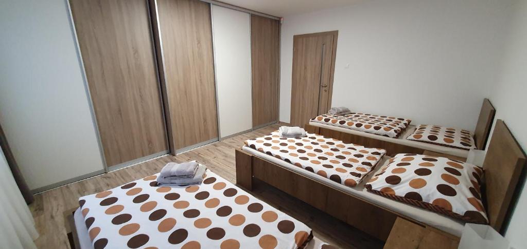 Postel nebo postele na pokoji v ubytování Ubytovanie HK